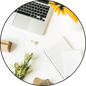 Image of laptop and notepad